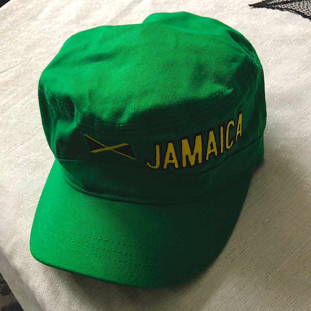 Newsboy style vibrant green hat with Jamaica logo. Never worn. Cool YehMon tag